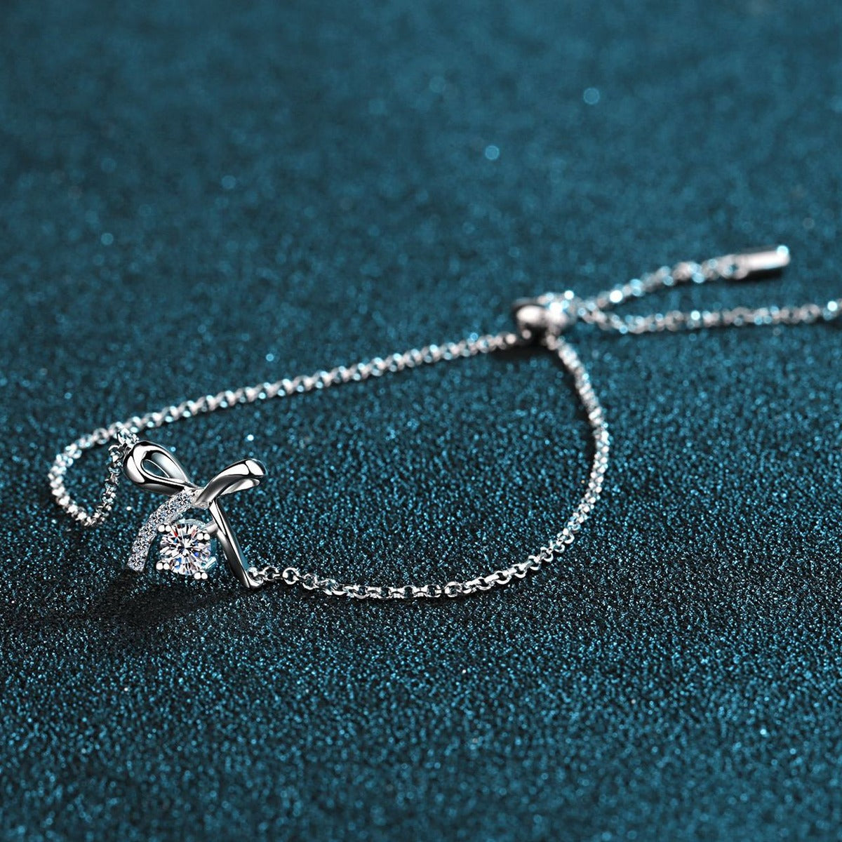 Bow Moissanite Adjustable Bracelet with CZ in Rhodium-Plated S925 sterling silver styled product scene showing stone sparkle and chain detail