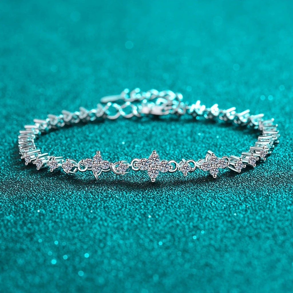 Four-Leaf Clover Moissanite Tennis Bracelet in Rhodium-Plated S925 sterling silver styled product scene showing stone sparkle and chain detail