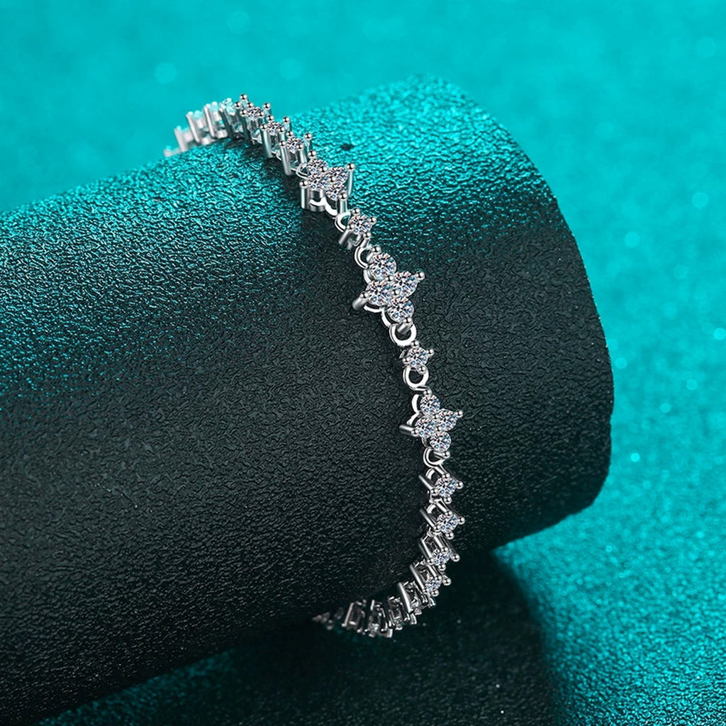 Four-Leaf Clover Moissanite Tennis Bracelet in Rhodium-Plated S925 sterling silver angled product display showing bracelet silhouette