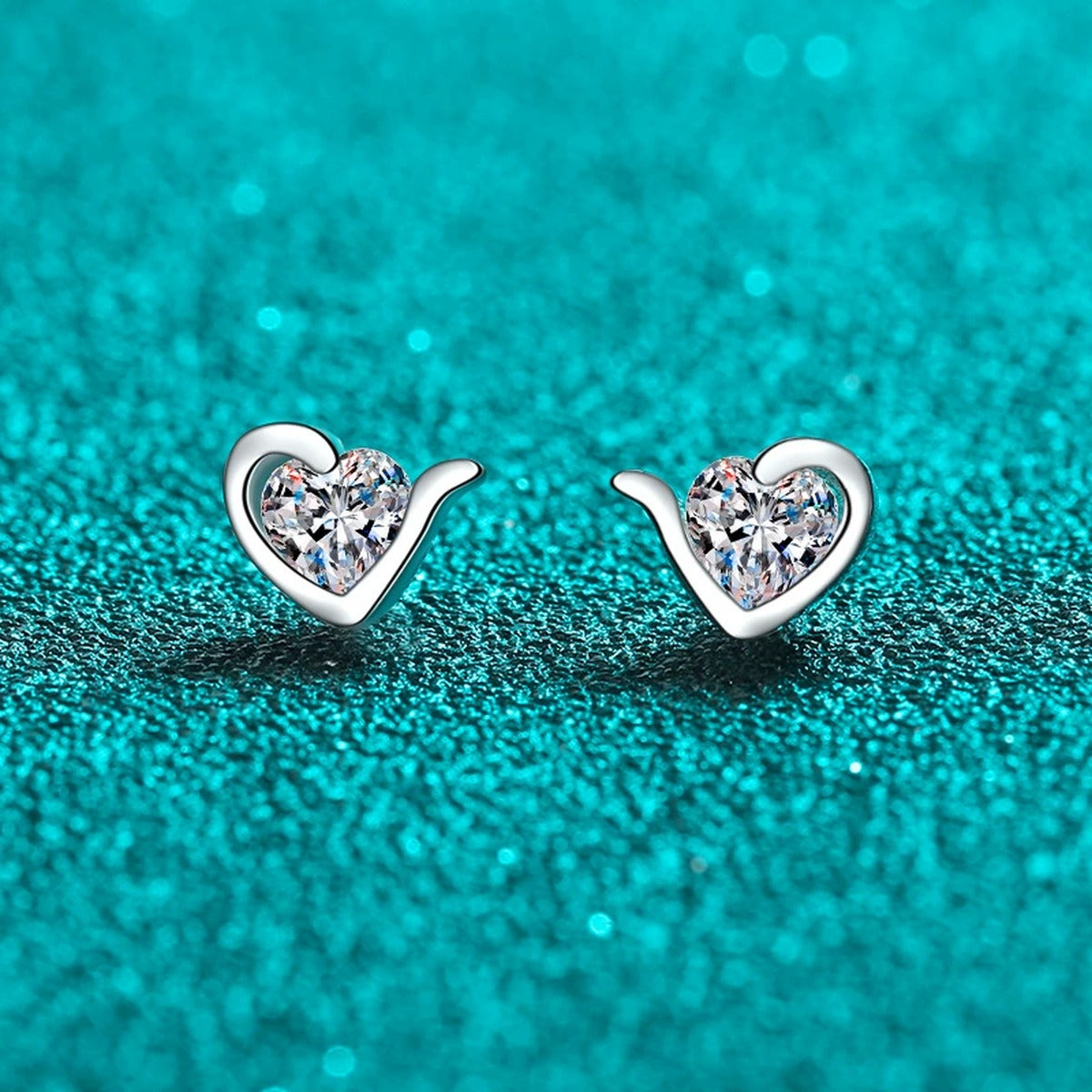 Heart Moissanite Stud Earrings in Rhodium-Plated S925 sterling silver product scene view showing front sparkle