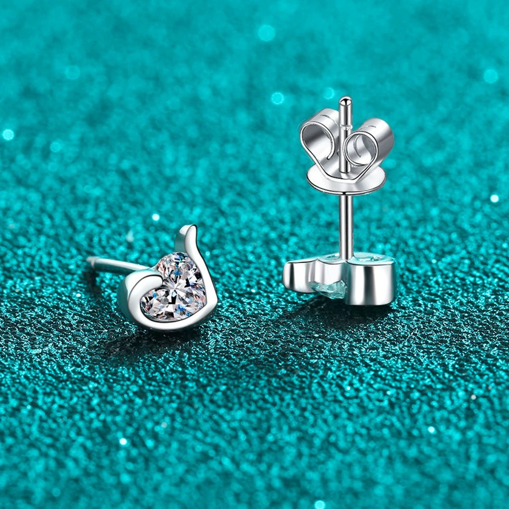 Heart Moissanite Stud Earrings in Rhodium-Plated S925 sterling silver product scene view showing angled setting detail