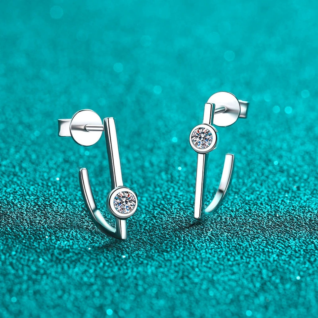Round Moissanite Stud Drop Earrings in Rhodium-Plated S925 sterling silver product scene view showing front sparkle
