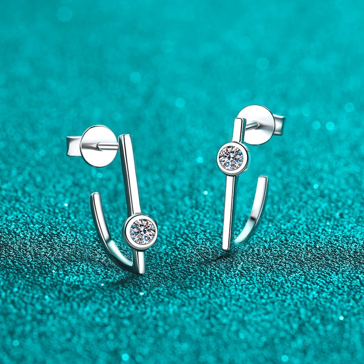 Round Moissanite Stud Drop Earrings in Rhodium-Plated S925 sterling silver product scene view showing front sparkle