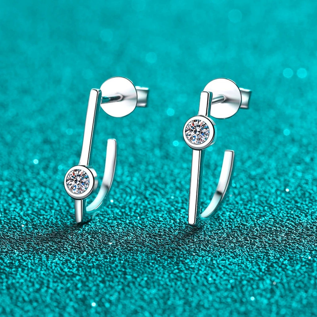 Round Moissanite Stud Drop Earrings in Rhodium-Plated S925 sterling silver product scene view showing angled setting detail