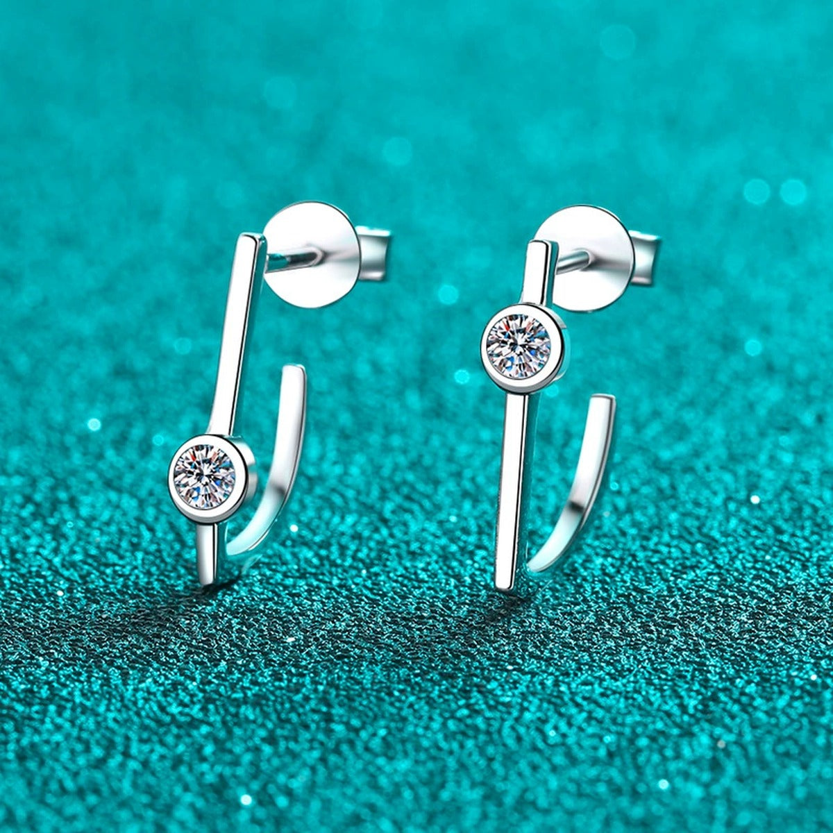 Round Moissanite Stud Drop Earrings in Rhodium-Plated S925 sterling silver product scene view showing angled setting detail