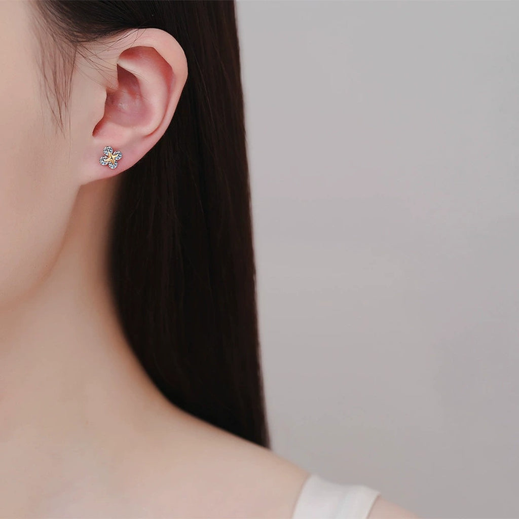 Clover Moissanite Stud Earrings in Champion Gold-Plated S925 sterling silver worn on ear by model showing scale, placement, and stud earrings styling