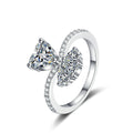 Heart Cut Moissanite Side Stone Engagement Ring with CZ in rhodium-plated S925 sterling silver on clean white background