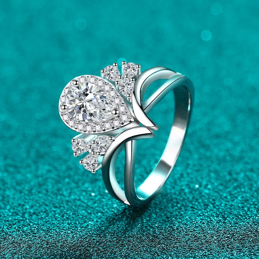 Pear Cut Moissanite Side Stone Engagement Ring with CZ product view showing moissanite setting and metal finish