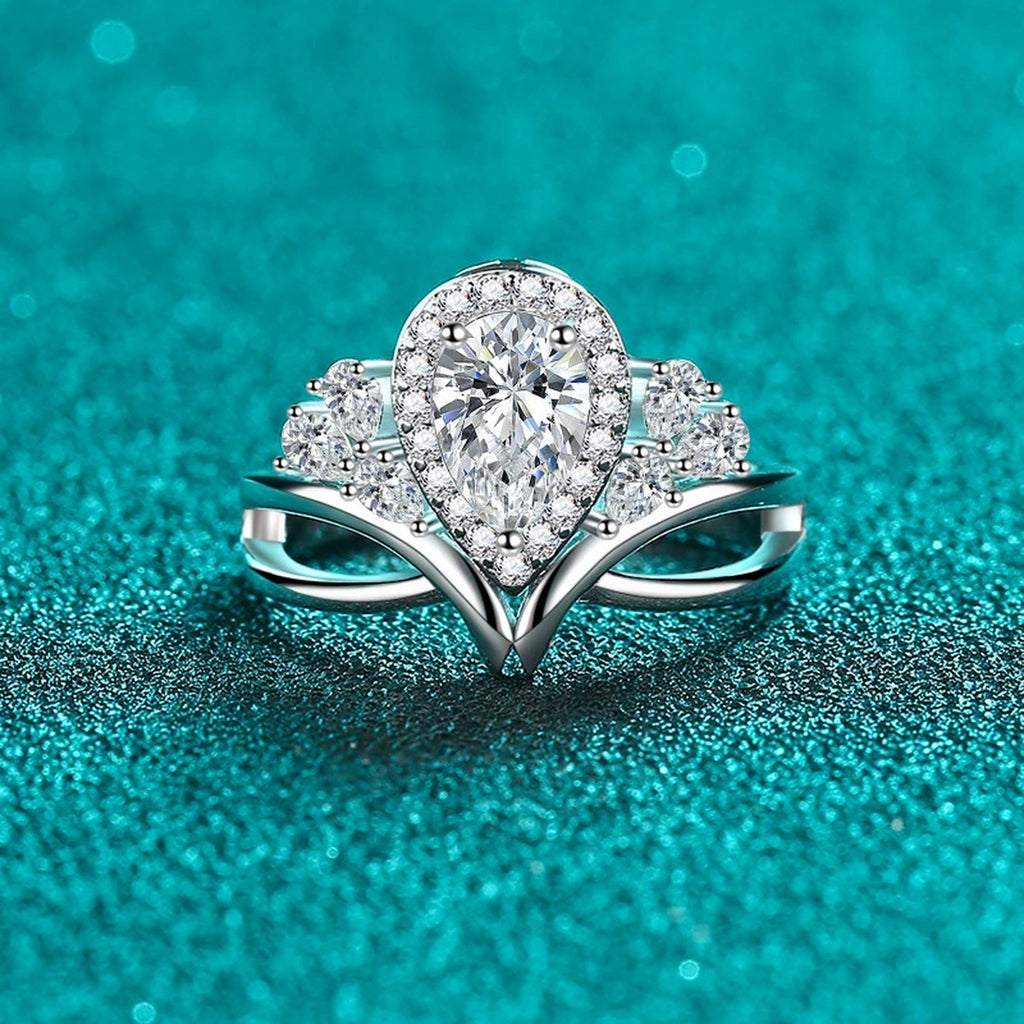 Pear Cut Moissanite Side Stone Engagement Ring with CZ product view showing moissanite setting and metal finish