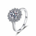 Round Moissanite Side Stone Ring with CZ in Rhodium-Plated S925 Sterling Silver clean white background product photo showing the ring silhouette and moissanite setting