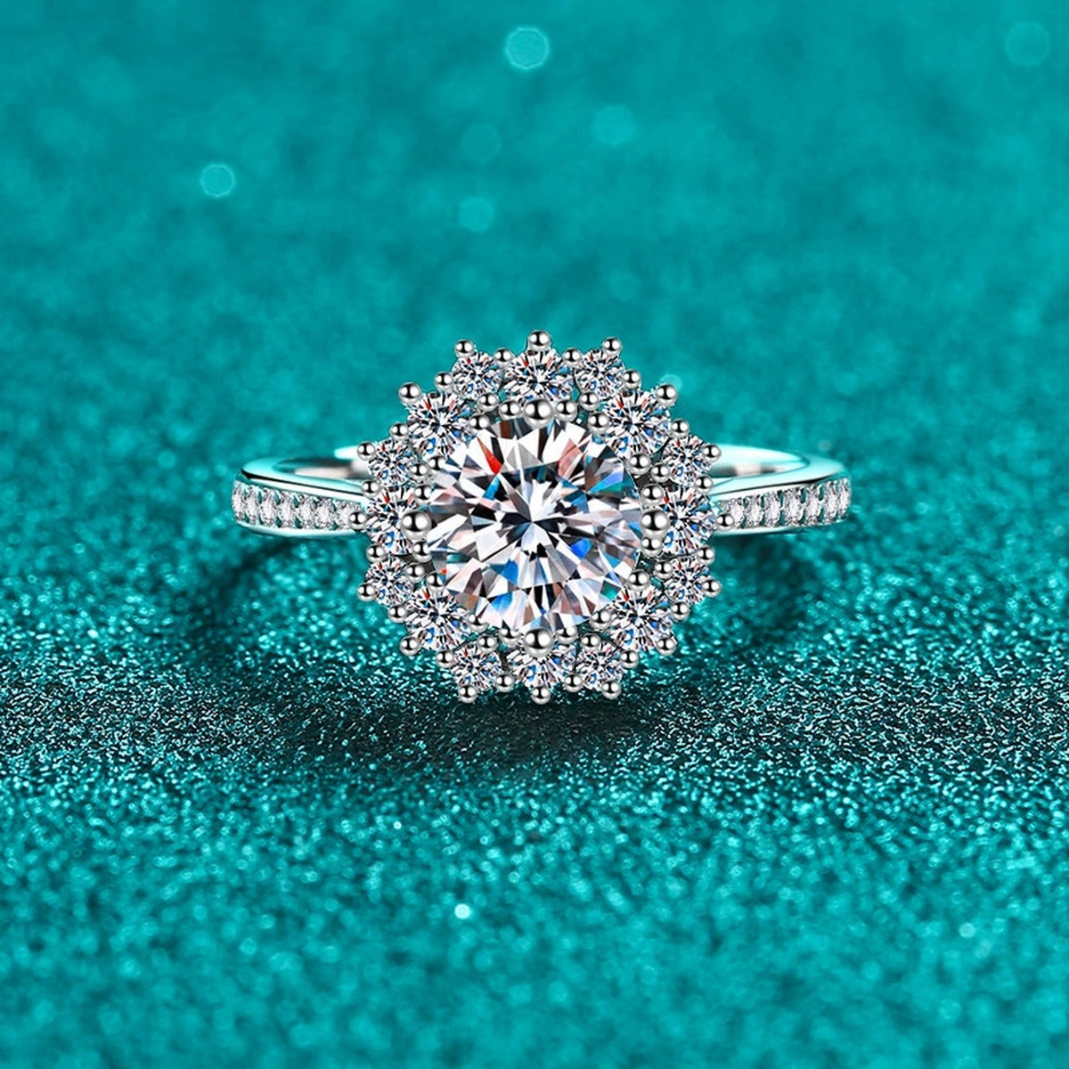 Round Moissanite Side Stone Ring with CZ in Rhodium-Plated S925 Sterling Silver blue display product photo showing the moissanite setting, stone cut, and band profile