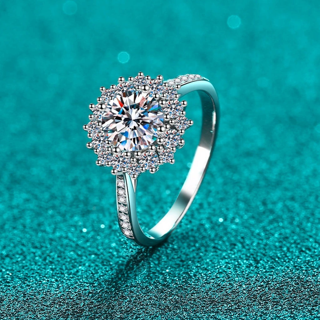 Round Moissanite Side Stone Ring with CZ in Rhodium-Plated S925 Sterling Silver blue display product photo showing the moissanite setting, stone cut, and band profile