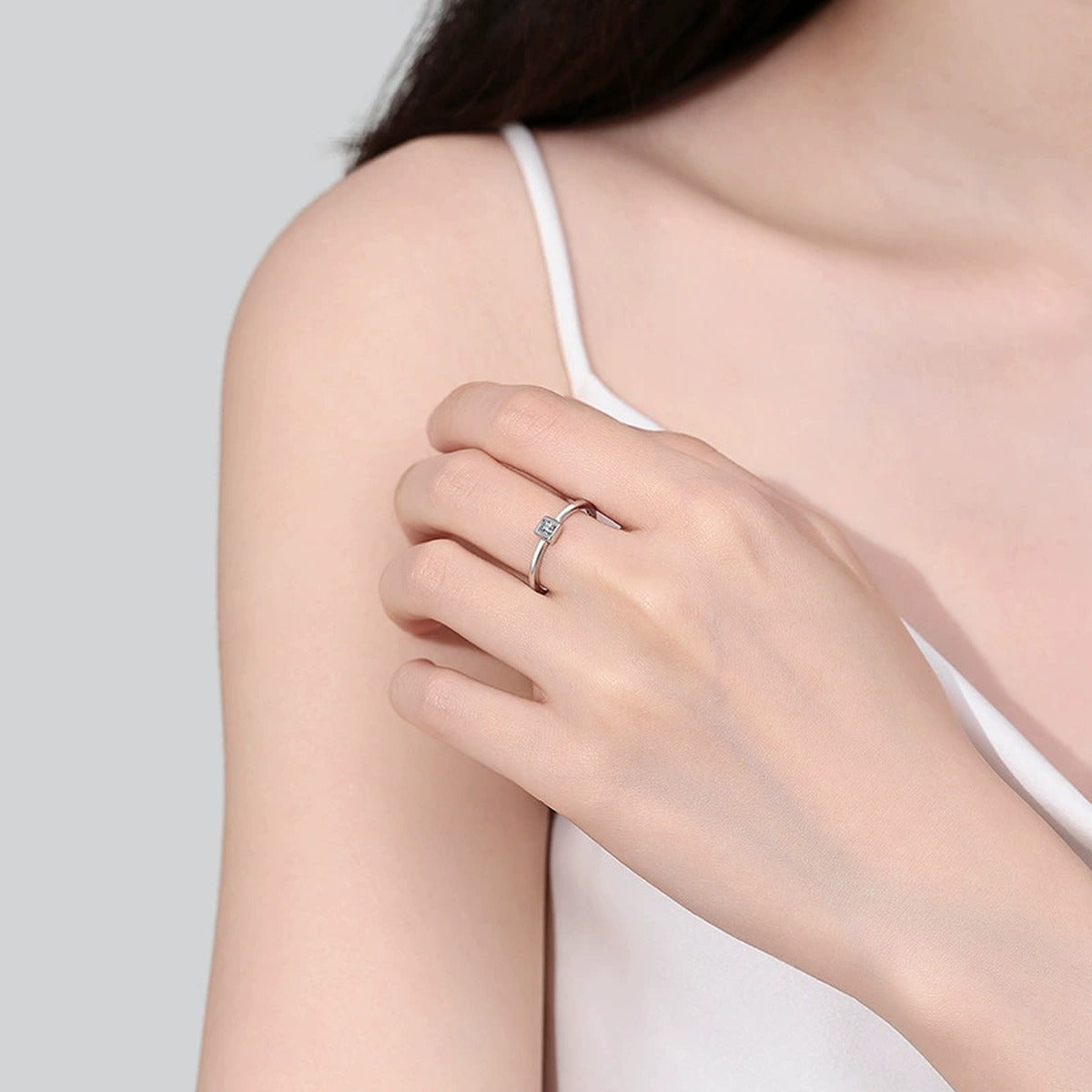 Princess Cut Moissanite Band Ring worn on hand to show scale, band width, and ring profile