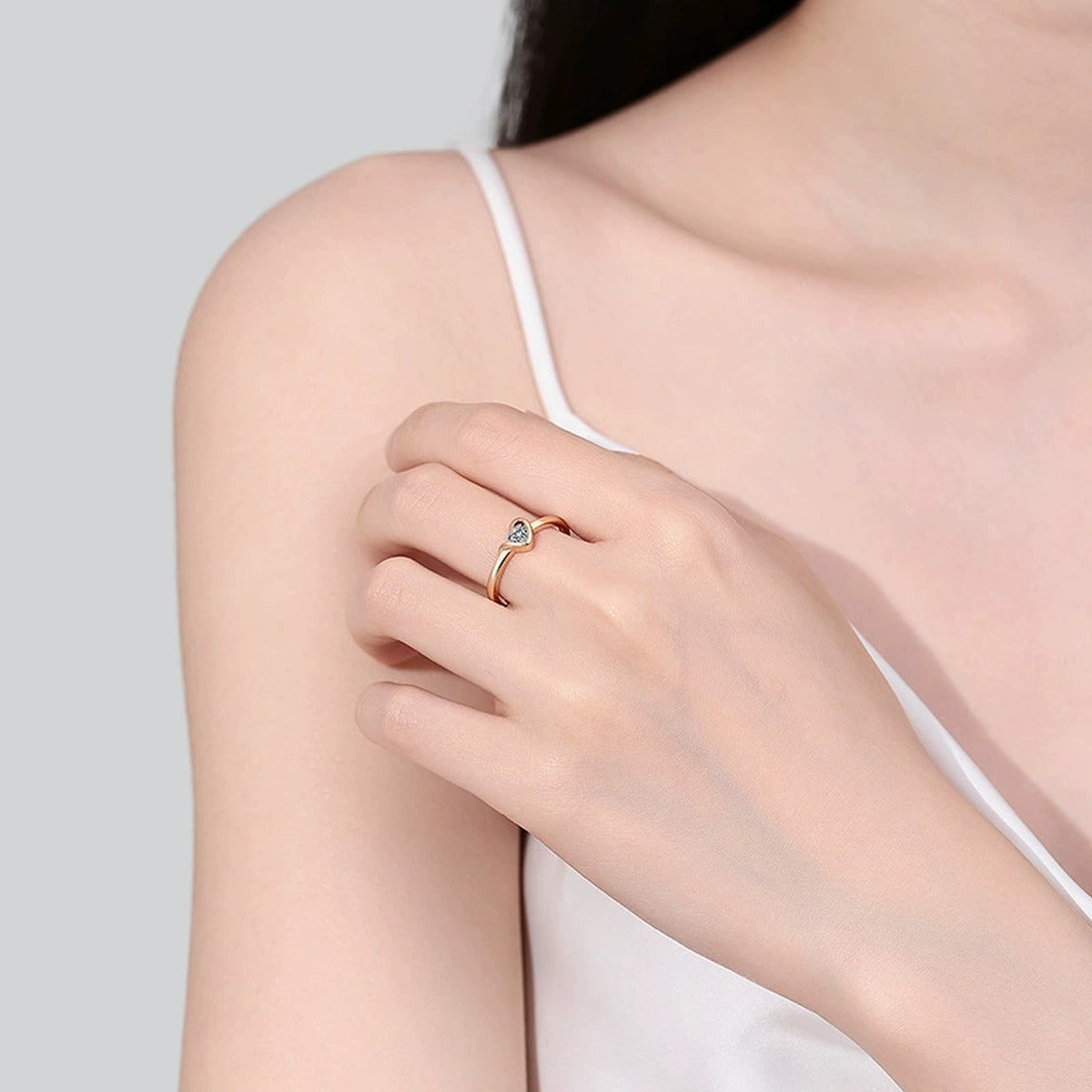 Heart Cut Moissanite Promise Ring worn on hand to show scale, band width, and ring profile
