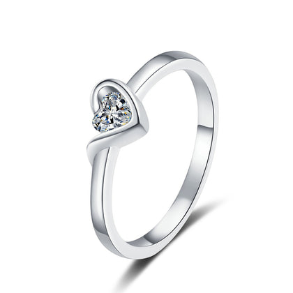 Heart Cut Moissanite Promise Ring in rhodium-plated S925 sterling silver on clean white background