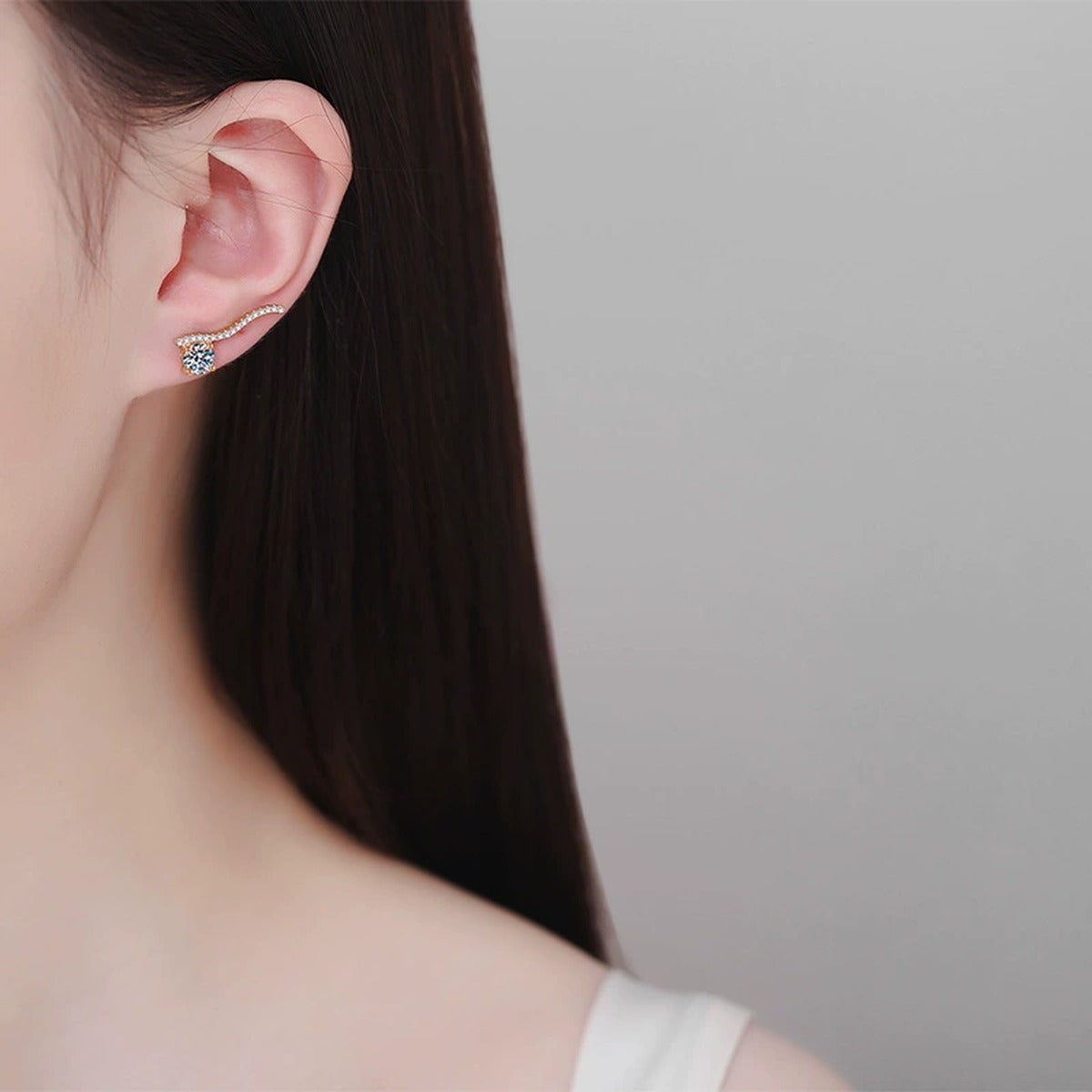 Round Moissanite Hook Ear Climber Earrings with CZ in Champion Gold-Plated S925 sterling silver worn on ear by model showing scale, placement, and earrings styling