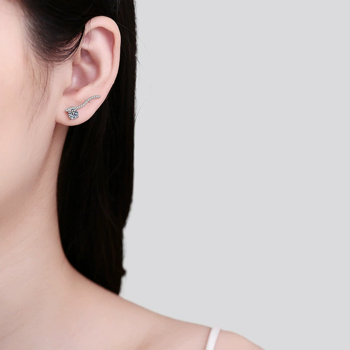 Round Moissanite Hook Ear Climber Earrings with CZ in Rhodium-Plated S925 sterling silver worn on ear by model showing scale, placement, and earrings styling