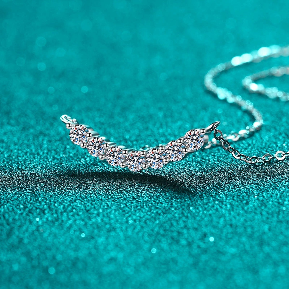 Curved Moissanite Bar Necklace in Rhodium-Plated S925 sterling silver close-up product scene showing pendant setting