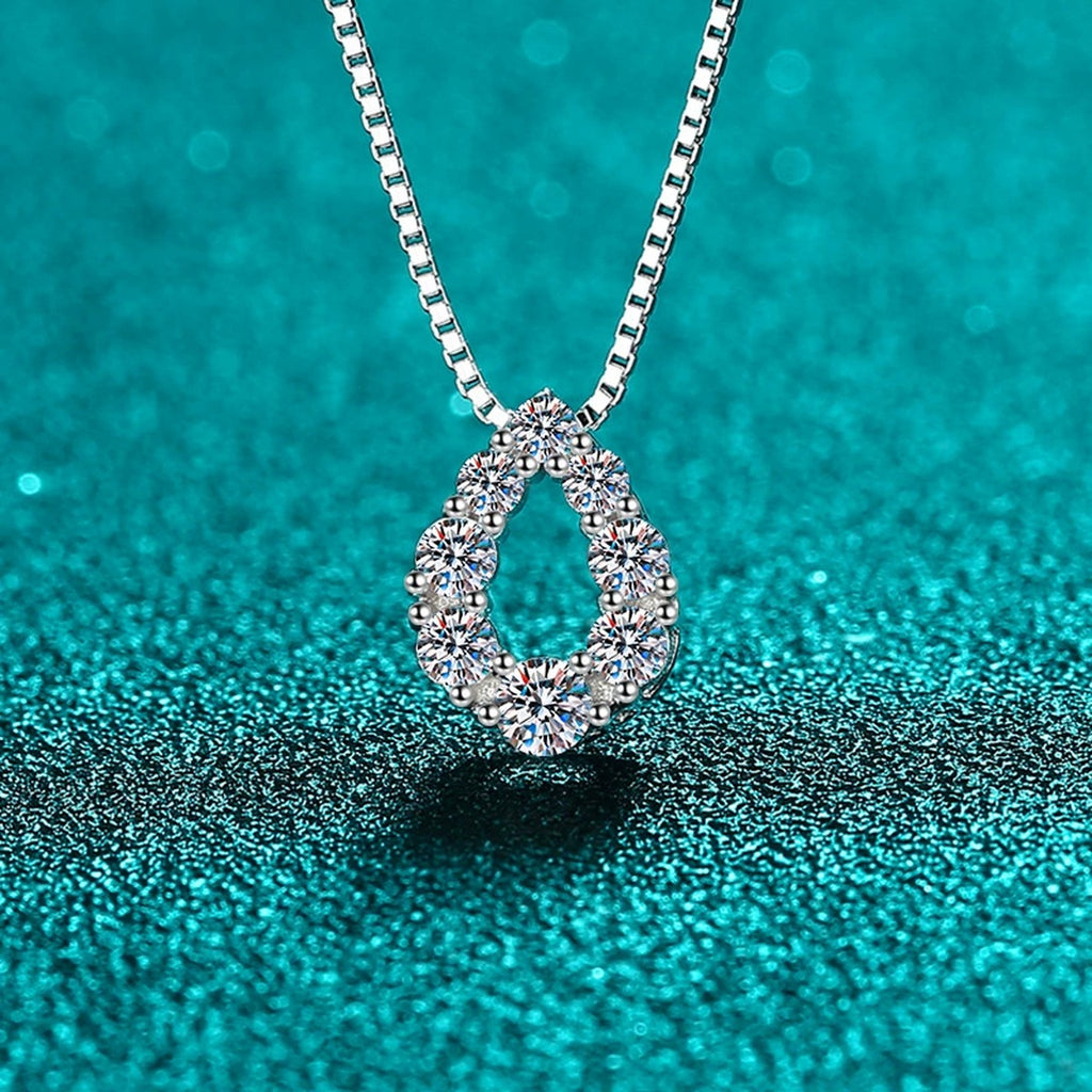 Teardrop Moissanite Pendant Necklace in Rhodium-Plated S925 sterling silver close-up product scene showing pendant setting