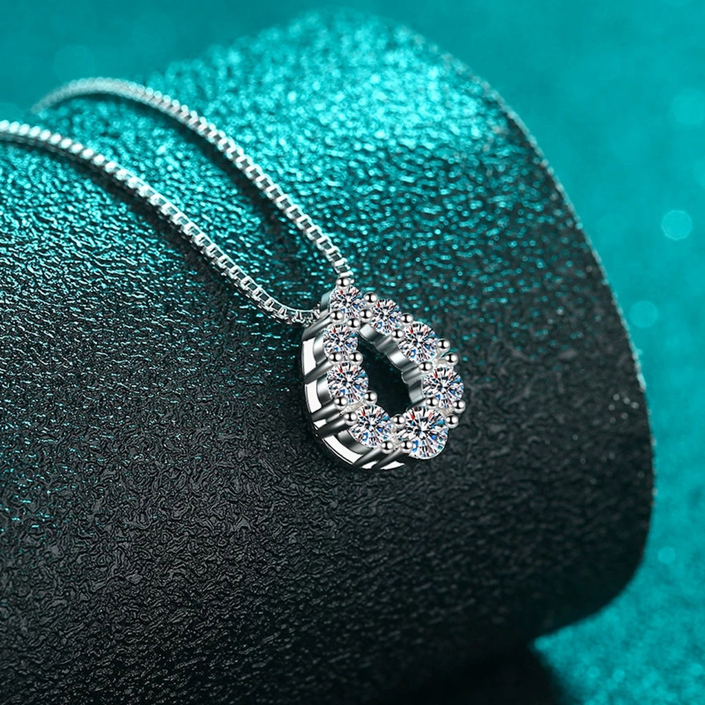 Teardrop Moissanite Pendant Necklace in Rhodium-Plated S925 sterling silver display scene showing chain and stone layout
