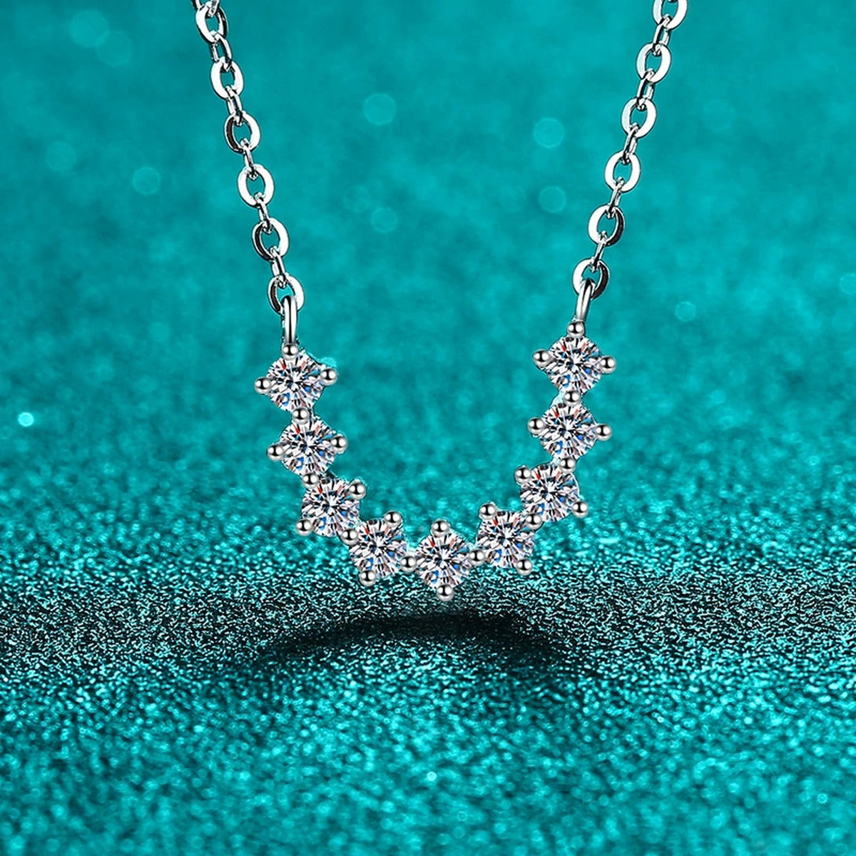 U-Shaped Moissanite Necklace in Rhodium-Plated S925 sterling silver close-up product scene showing pendant setting