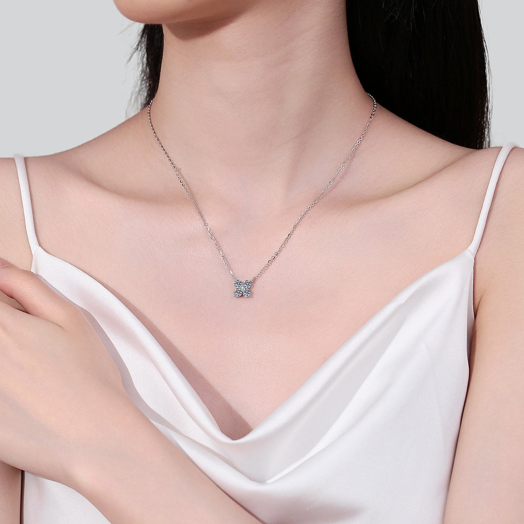 Clover Round Moissanite Necklace in Rhodium-Plated S925 sterling silver neckline model view showing pendant scale and adjustable chain