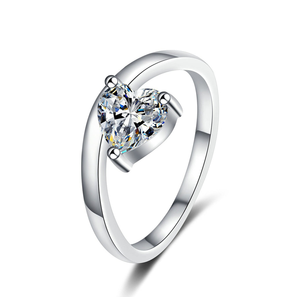 Heart Cut Moissanite Side Stone Engagement Ring in rhodium-plated S925 sterling silver on clean white background