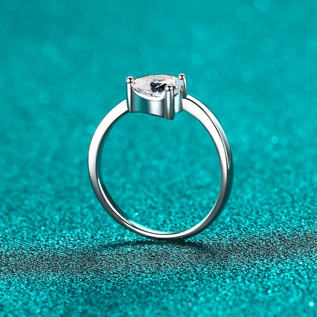 Heart Cut Moissanite Side Stone Engagement Ring product view showing moissanite setting and metal finish