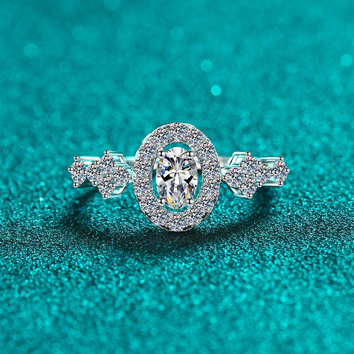 Blue and White Oval Moissanite Ring with CZ in Rhodium-Plated S925 Sterling Silver blue display product photo showing the moissanite setting, stone cut, and band profile