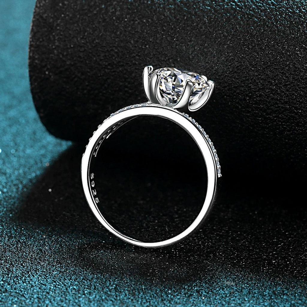Round Moissanite Split Shank Engagement Ring with CZ product view showing moissanite setting and metal finish