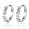 Cluster Moissanite Hoop Earrings in Rhodium-Plated S925 sterling silver white background product photo showing the pair, stone shape, and hoop earrings silhouette