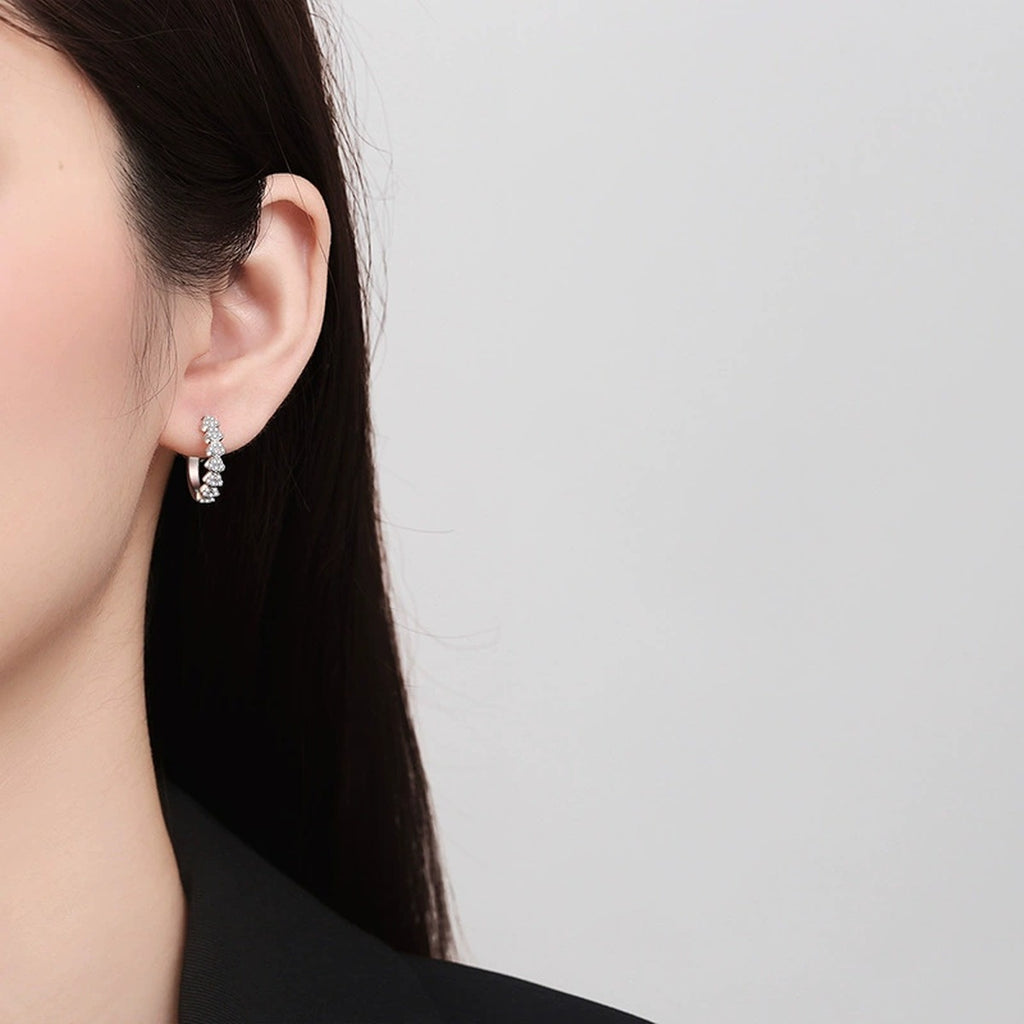 Cluster Moissanite Hoop Earrings in Rhodium-Plated S925 sterling silver worn on ear by model showing scale, placement, and hoop earrings styling