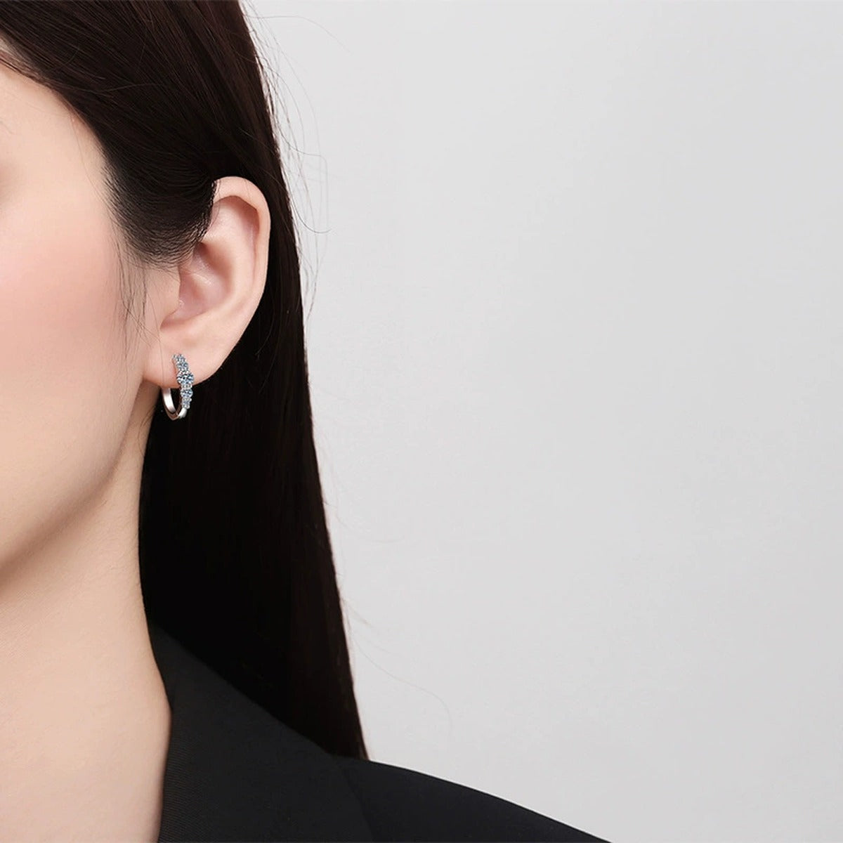 Cluster Moissanite Hoop Earrings in Rhodium-Plated S925 sterling silver worn on ear by model showing scale, placement, and hoop earrings styling