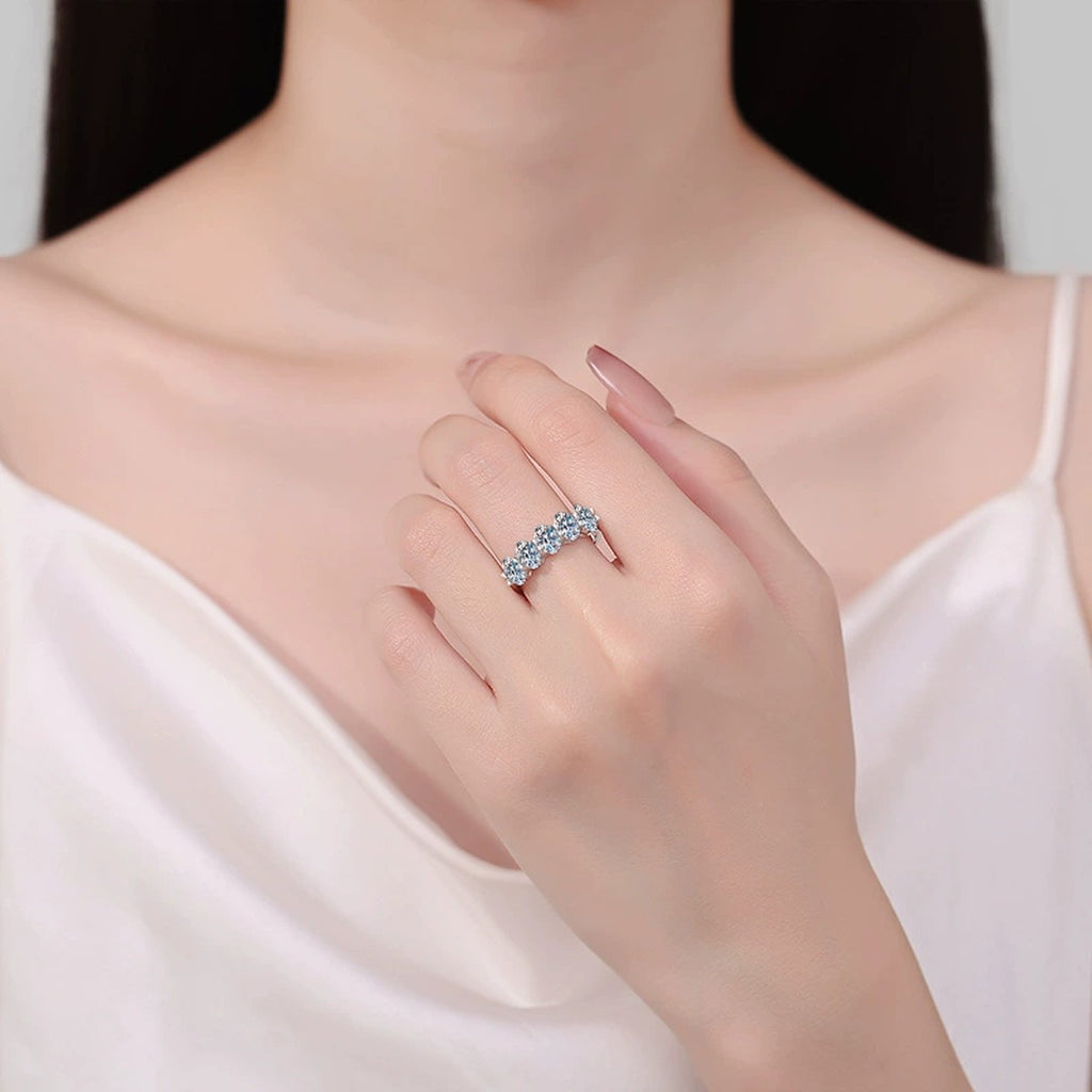 Oval Moissanite Five-Stone Ring worn on hand to show scale, band width, and ring profile