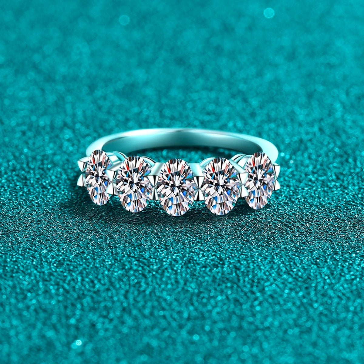 Oval Moissanite Five-Stone Ring product view showing moissanite setting and metal finish