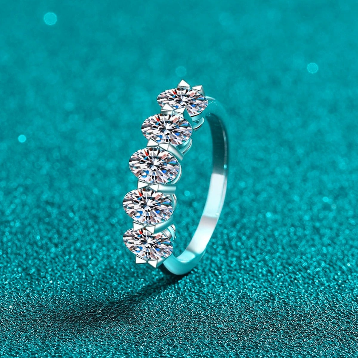 Oval Moissanite Five-Stone Ring product view showing moissanite setting and metal finish