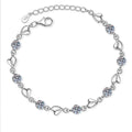 Heart Charm Moissanite Adjustable Bracelet in Rhodium-Plated S925 sterling silver white background product photo showing bracelet shape and moissanite setting
