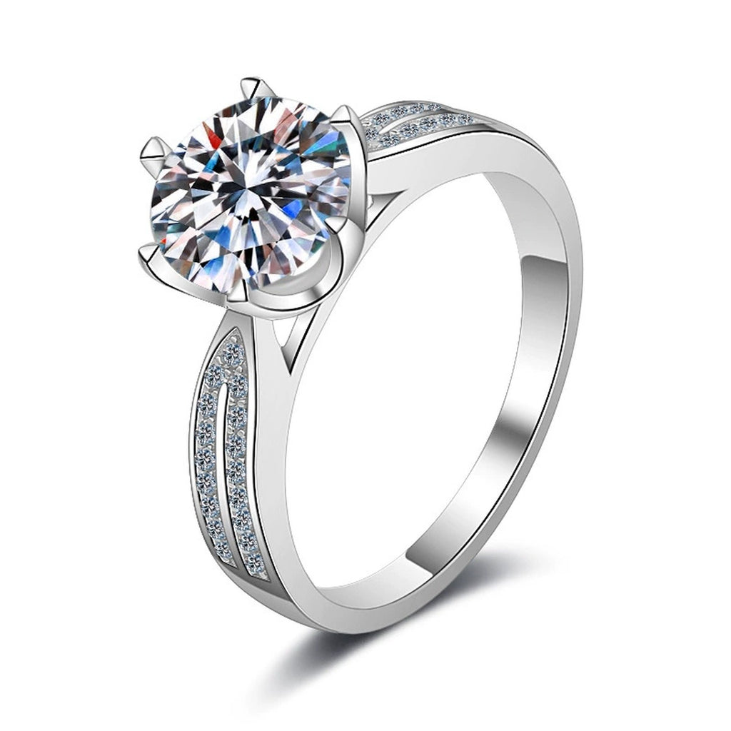 Round Moissanite Side Stone Ring with CZ in rhodium-plated S925 sterling silver on clean white background