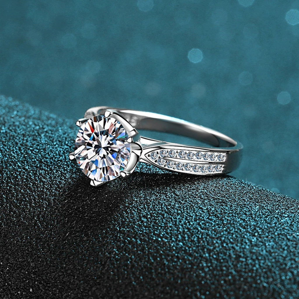 Round Moissanite Side Stone Ring with CZ product view showing moissanite setting and metal finish