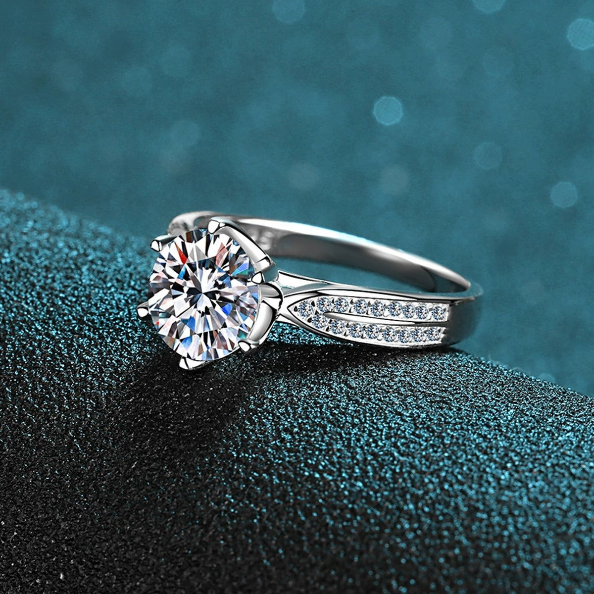 Round Moissanite Side Stone Ring with CZ product view showing moissanite setting and metal finish