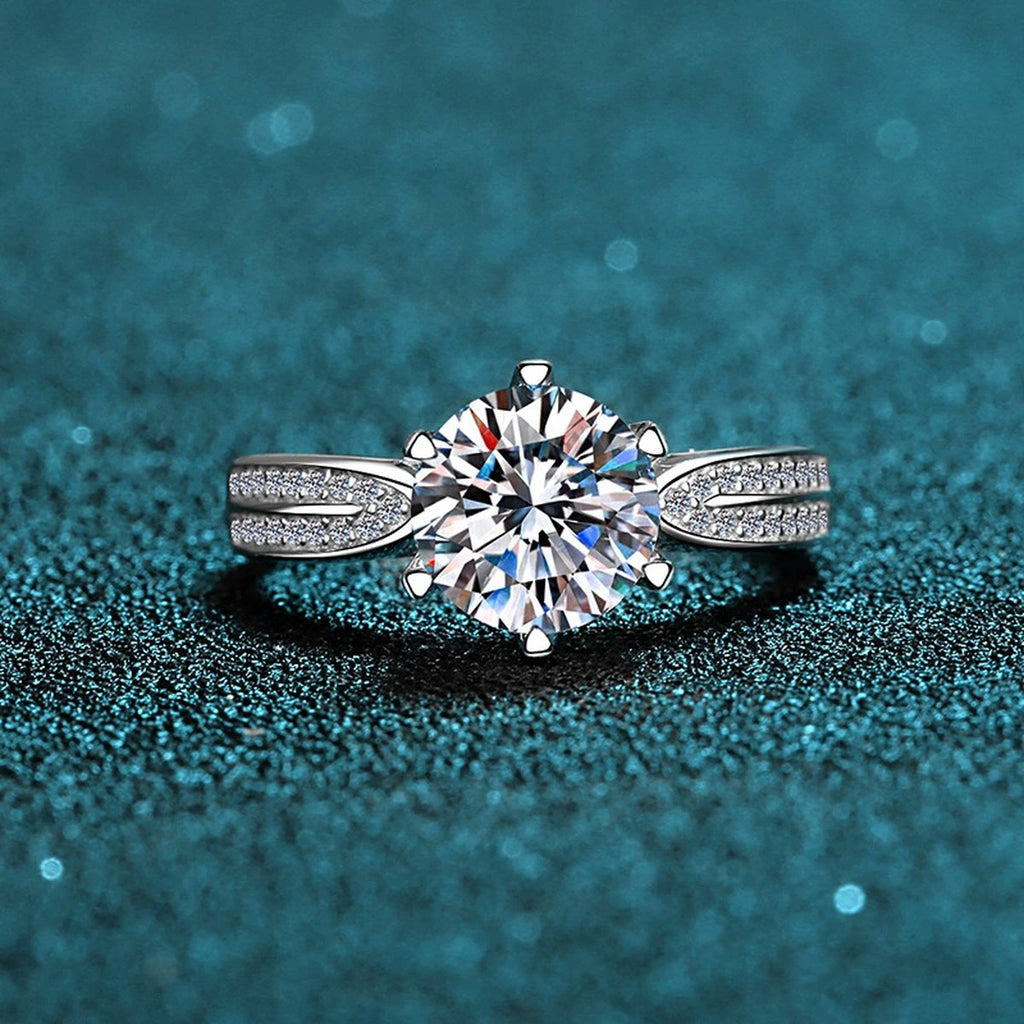 Round Moissanite Side Stone Ring with CZ product view showing moissanite setting and metal finish