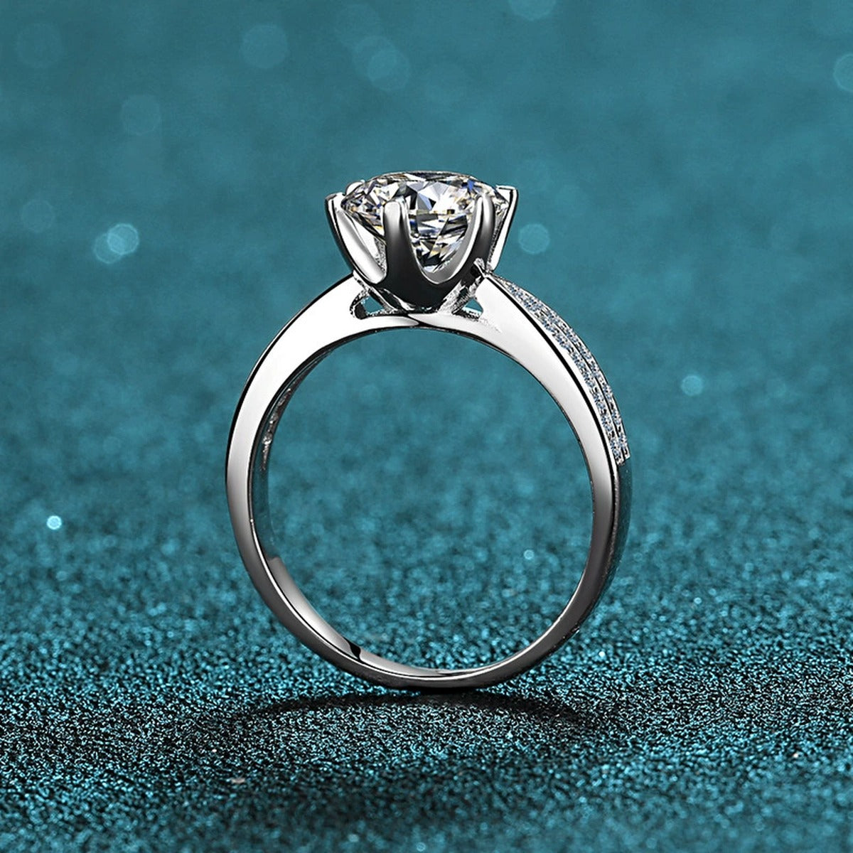 Round Moissanite Side Stone Ring with CZ product view showing moissanite setting and metal finish