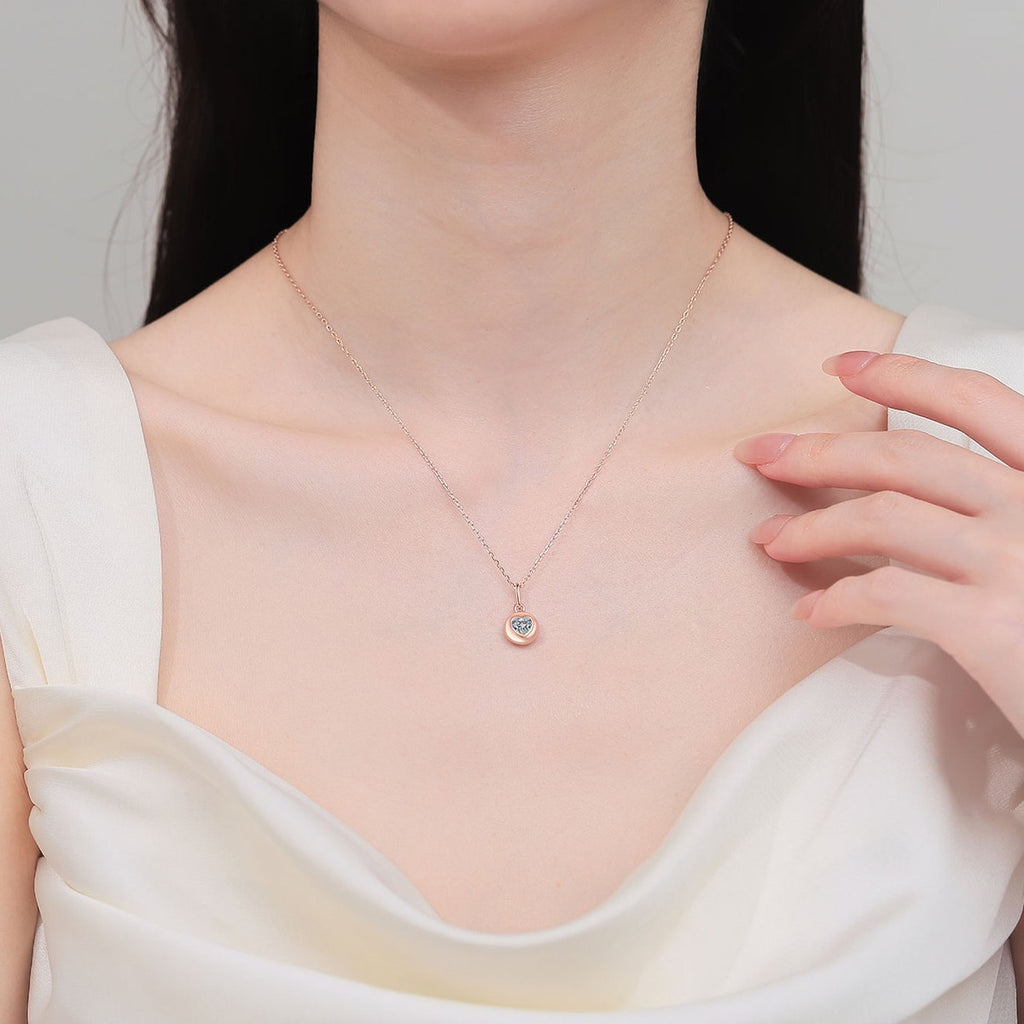 Heart Bead Moissanite Pendant Necklace in Champion Gold-Plated S925 sterling silver neckline model view showing pendant scale and adjustable chain