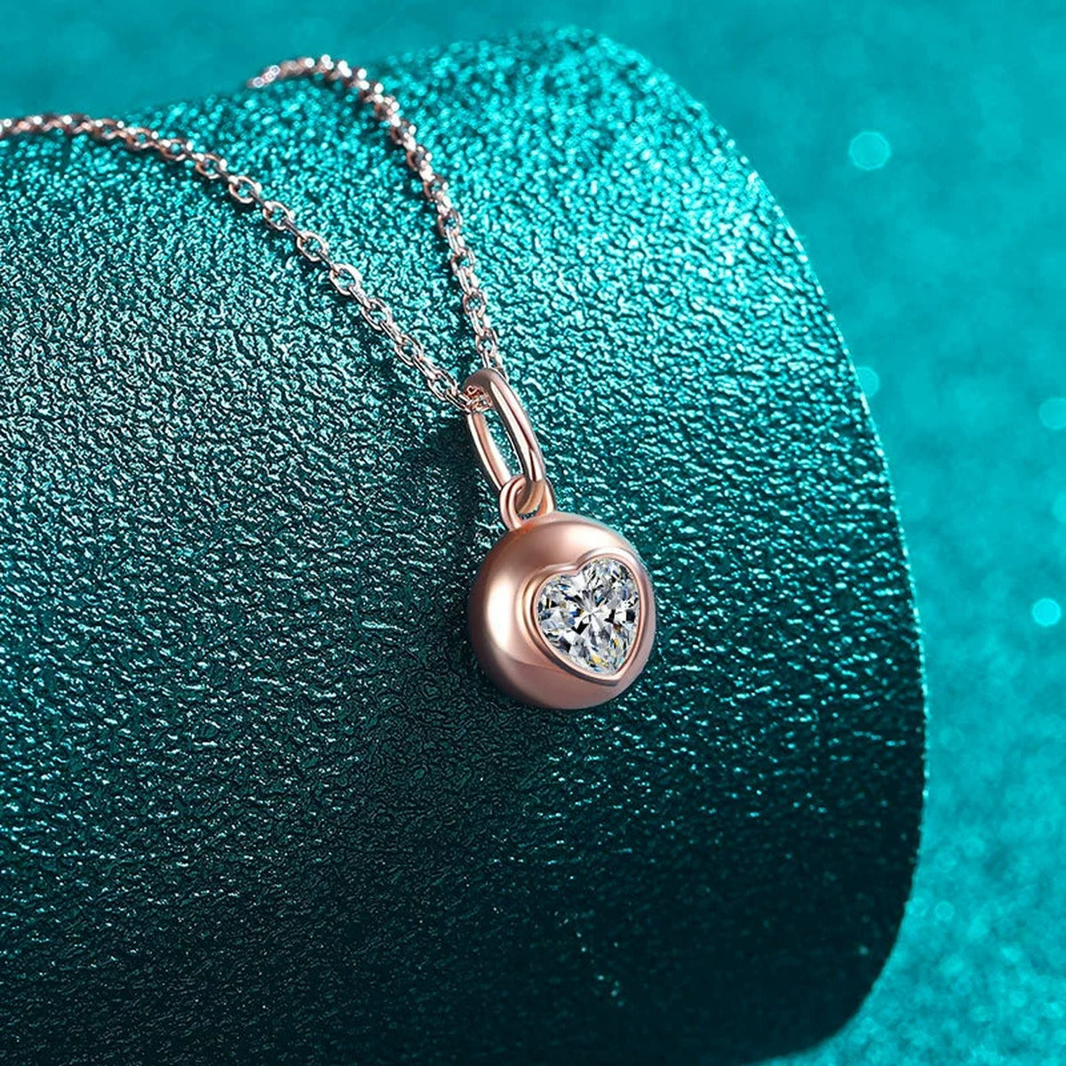 Heart Bead Moissanite Pendant Necklace in Champion Gold-Plated S925 sterling silver blue display scene showing chain and stone layout