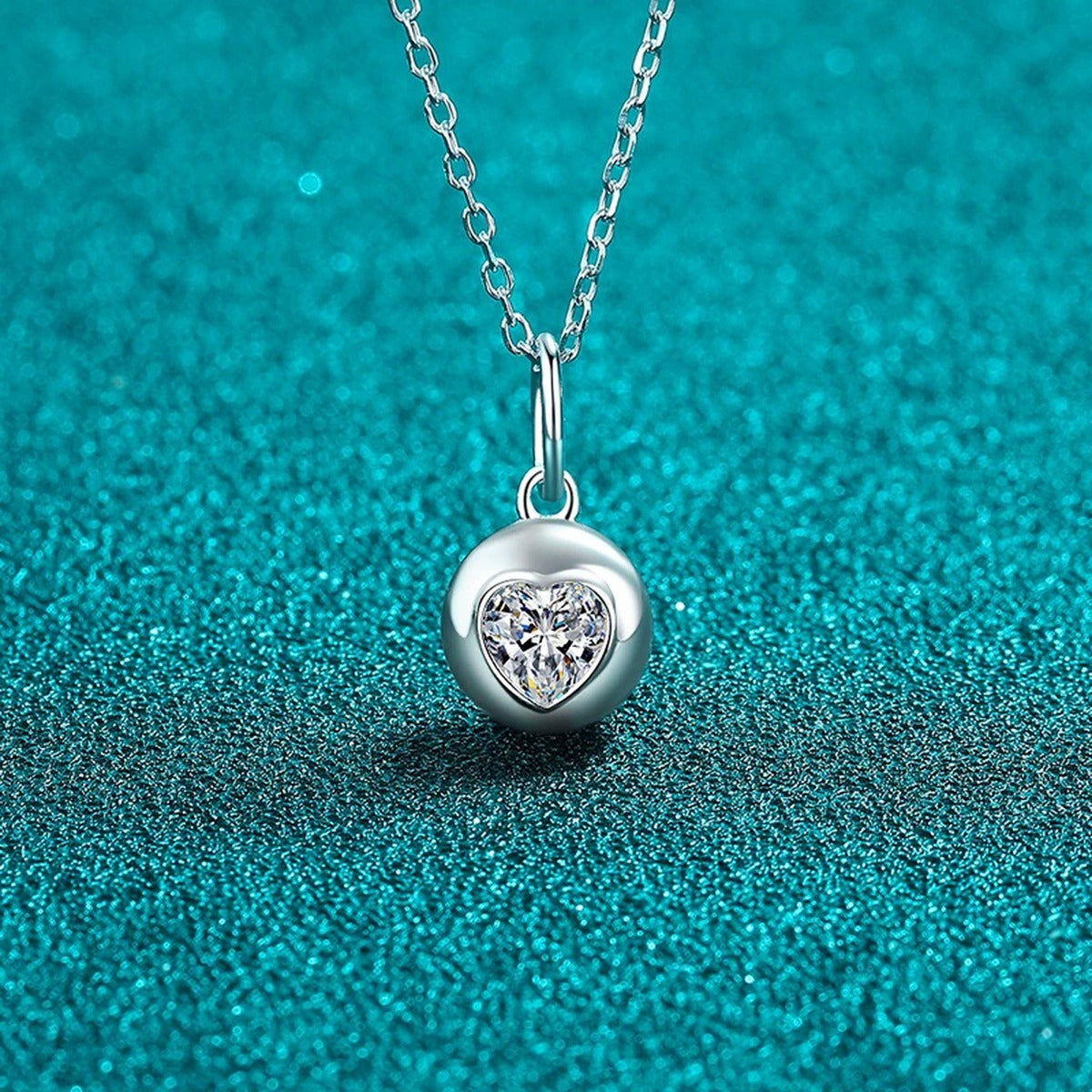 Heart Bead Moissanite Pendant Necklace in Rhodium-Plated S925 sterling silver blue display scene showing chain and stone layout