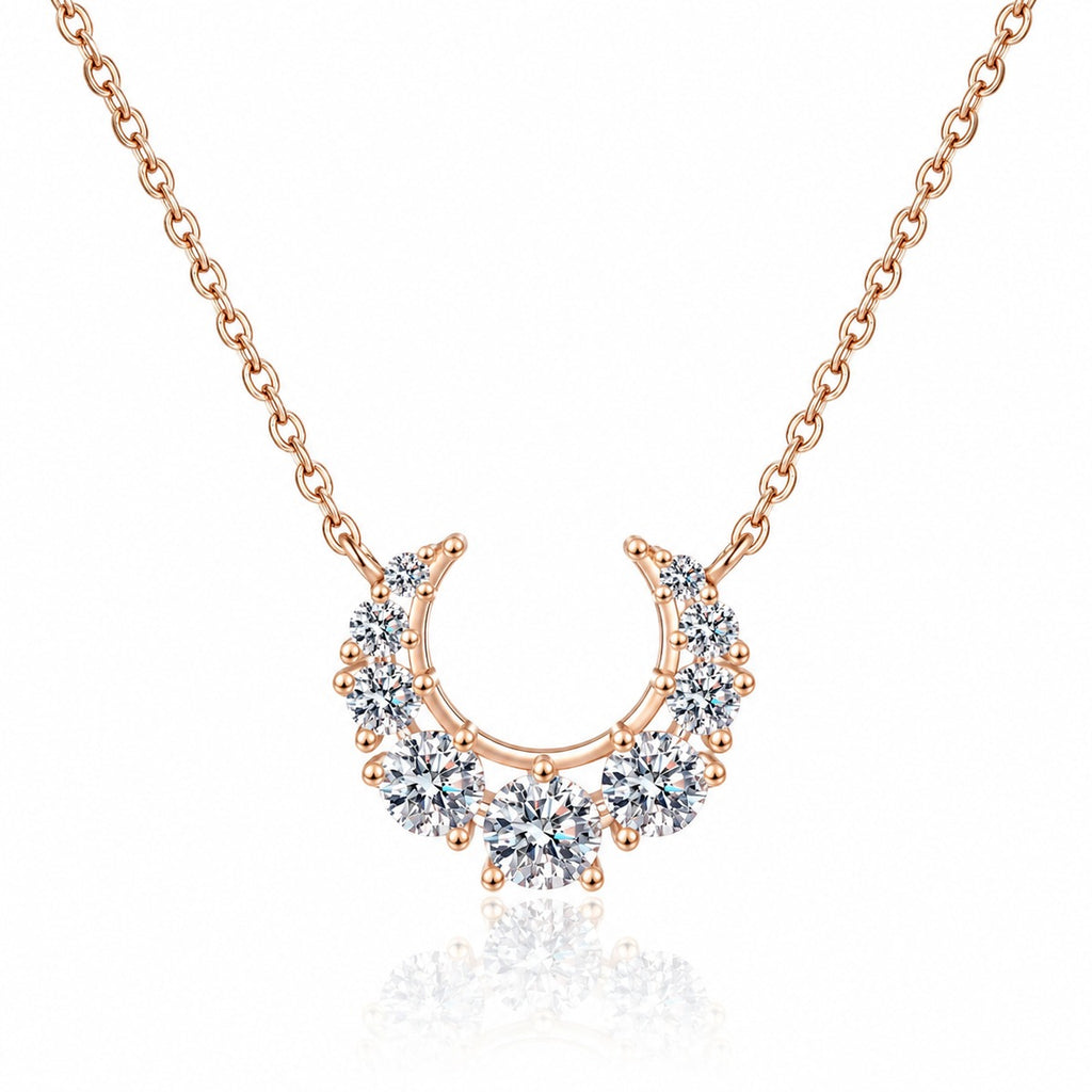 Crescent Moissanite Necklace in Champion Gold-Plated S925 sterling silver white background product photo showing crescent moon necklace with graduated round moissanite stones