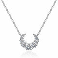 Crescent Moissanite Necklace in Rhodium-Plated S925 sterling silver white background product photo showing crescent moon necklace with graduated round moissanite stones