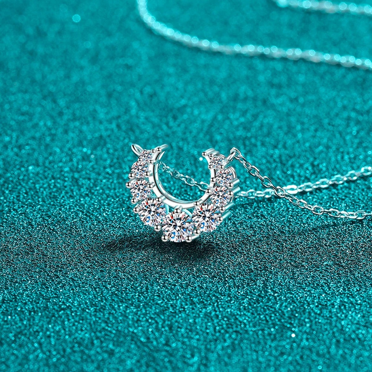 Crescent Moissanite Necklace in Rhodium-Plated S925 sterling silver blue display scene showing chain and stone layout