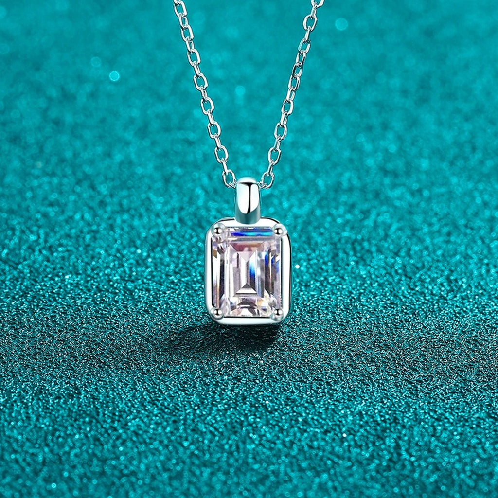 Emerald and Radiant Cut Moissanite Pendant Necklace in Rhodium-Plated S925 sterling silver blue display scene showing chain and stone layout