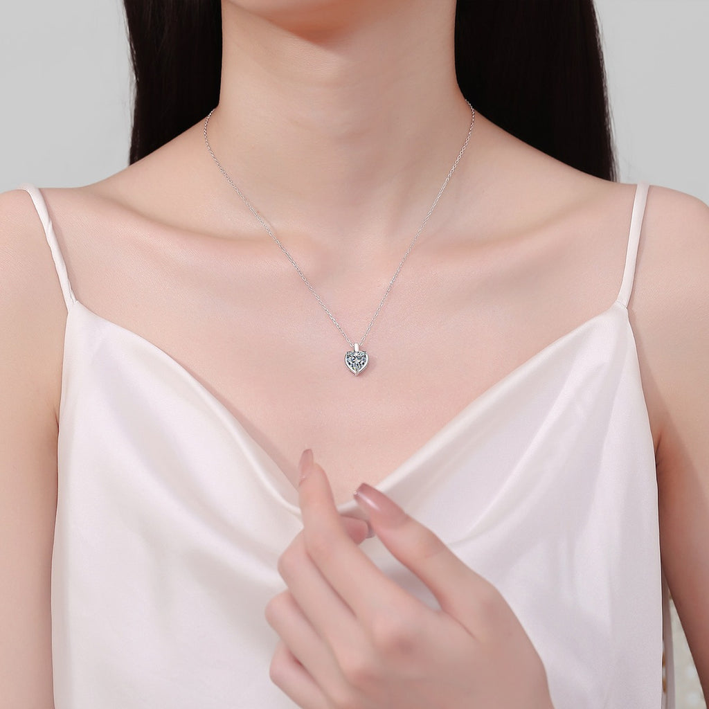 Heart Moissanite Pendant Necklace in Rhodium-Plated S925 sterling silver neckline model view showing pendant scale and adjustable chain